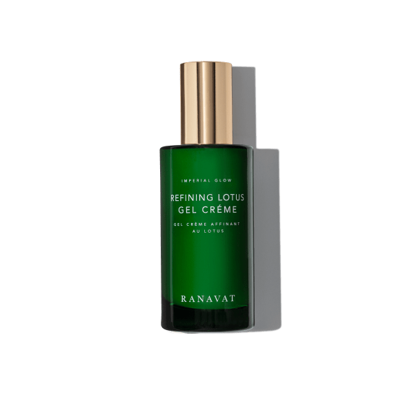 Green bottle of Refining Lotus Gel Creme on a white background